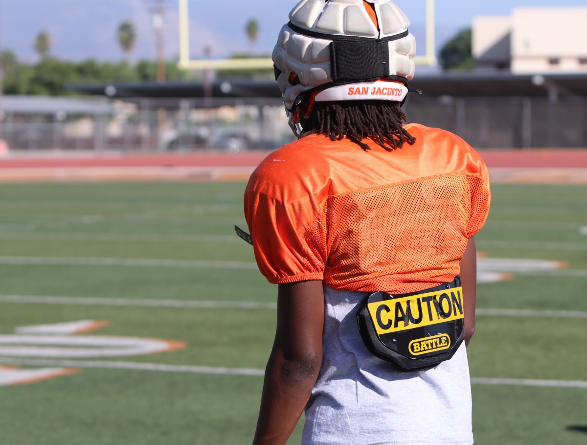 The caution decal on the back of his jersey warns all 11 defenders that something special is on the field. Photo: John Murphy